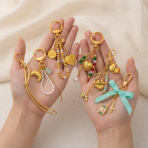 Lussuoso Portachiavi in Rame Placcato Oro 18K con Ciondolo per Borsa con Perla Artificiale Strass Fiocco Regalo Donna Ragazza