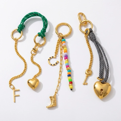 Vintage Elegant Alloy Rhinestone Bag Charm With Woven Rope Heart Key Evil Eye Pendants For Women Fashion Handbag Keychain