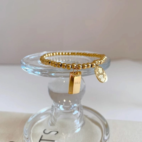Fashion Copper Alloy Gold Plated Bead Bracelet With Lucky Rich Charms Gold Bar Pendant Elastic Jewelry Gift For Women