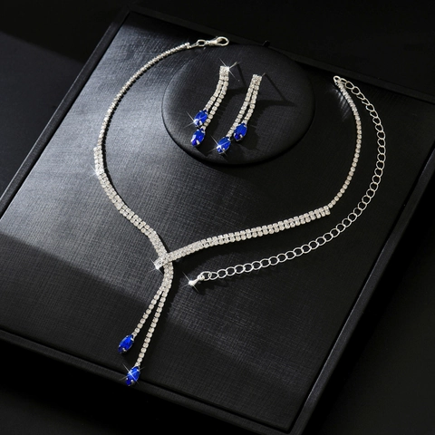 Parure de Bijoux Luxueuse en Cuivre Plaqué Argent Collier en Strass Floraux et Boucles d'Oreilles Pendantes Assorties pour Mariage Fête Femme Accessoires de Soirée