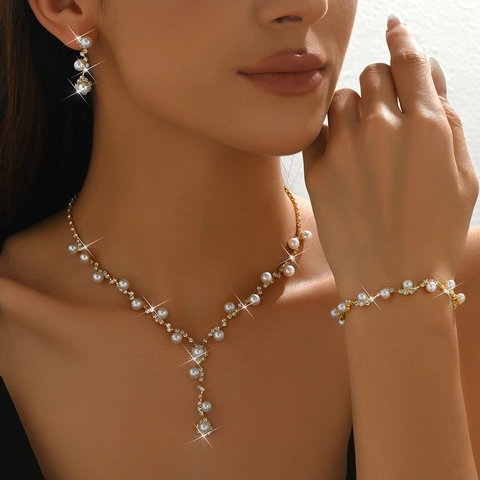 Elegantes Kupfer Künstliche Perle Strass Schmuckset Für Damen Hochzeit Bankett Halskette Ohrringe Armband Schmuck