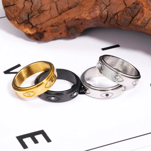 Bague Spinner Mauvais Œil en Acier Titane Anneau de Bande Rotatif Incrusté de Strass Bijoux Hip Hop Mode Vintage pour Hommes Femmes