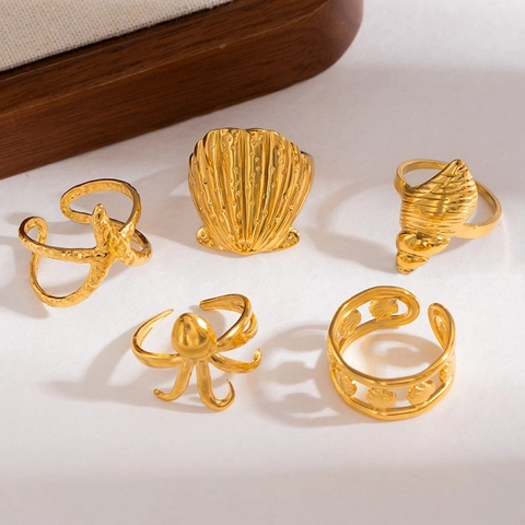 Anello Aperto Serie Oceano in Acciaio Inossidabile Polpo Stella Marina Conchiglia Regolabile Placcato Oro Donna