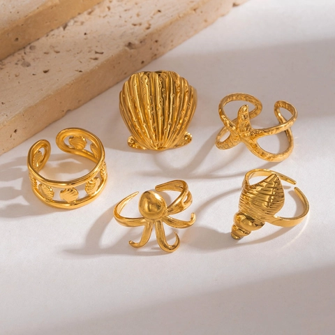 Anello Aperto Serie Oceano in Acciaio Inossidabile Polpo Stella Marina Conchiglia Regolabile Placcato Oro Donna