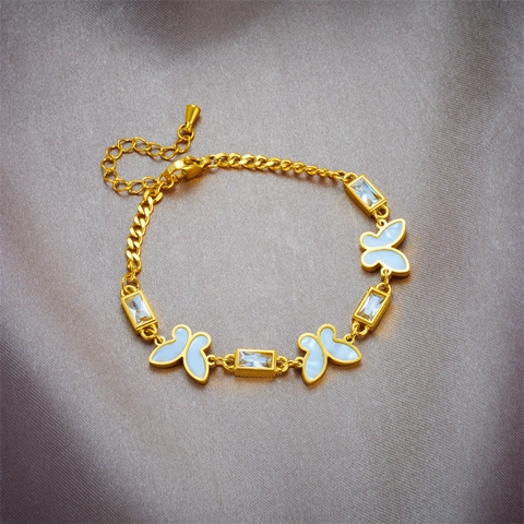 Bracelet en Acier Inoxydable de Mode Coréenne pour Femmes Plqué Or Papillon Fleur Strass Perle Artificielle Charme Bracelet Réglable Bijoux Cadeau