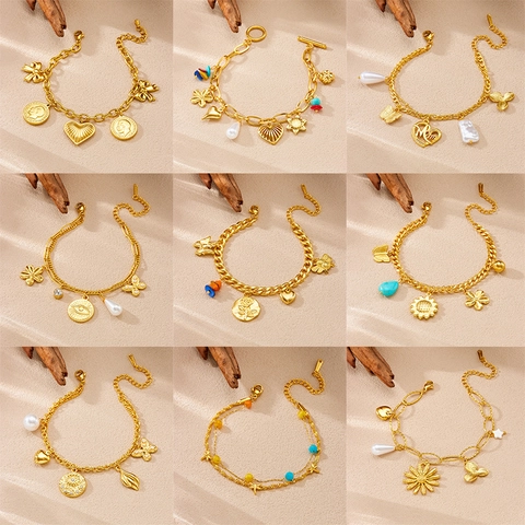 Bracelet Vintage en Acier Inoxydable Plaqué Or Avec Multiples Breloques pour Femme Cœur Papillon Mauvais Œil Perle Artificielle Pièce Bijoux
