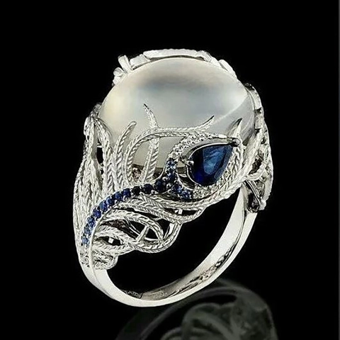 Anillo de Cobre Plateado Vintage con Piedra Lunar para Mujer Circón Azul Floral Hueco Redondo Aspecto Opale Joyería Banquete