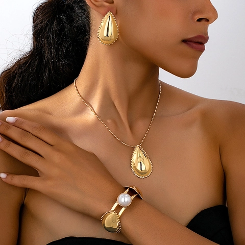 Mode Legierung Kunstperle Wassertropfen Muschel Floral Geometrisch Bambus Halskette Ohrringe Armband Ring Für Damen