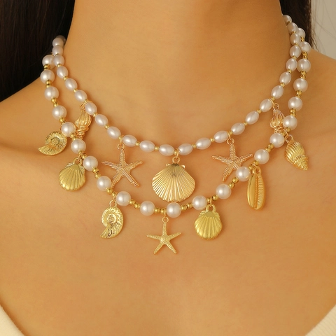 Collier Pendentif Étoile de Mer Conque Coquillage Océan Bohème pour Femme Ajustable Été Plage Vacances Perle Artificielle Bijoux en Alliage