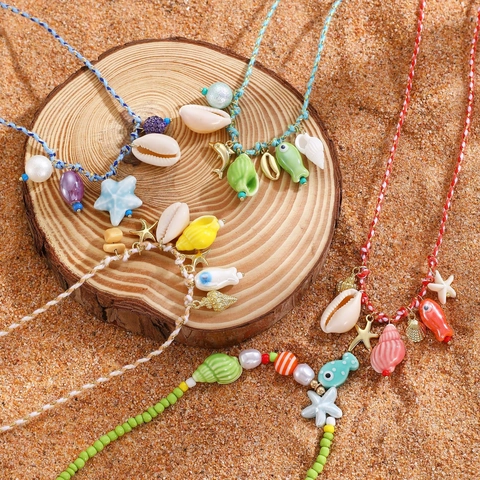 Collana con Pendente a Forma di Stella Marina e Conchiglia Boemia Corda Intrecciata Colorata Pesce in Ceramica Gioielli da Spiaggia