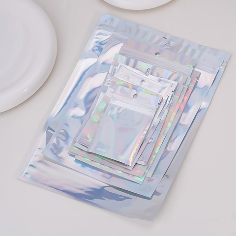 Bolsas Ziplock Holográficas para Joyería Bolsas de Embalaje de Arcoíris Láser Reutilizables Con Agujero para Colgar Antioxidación Plástico