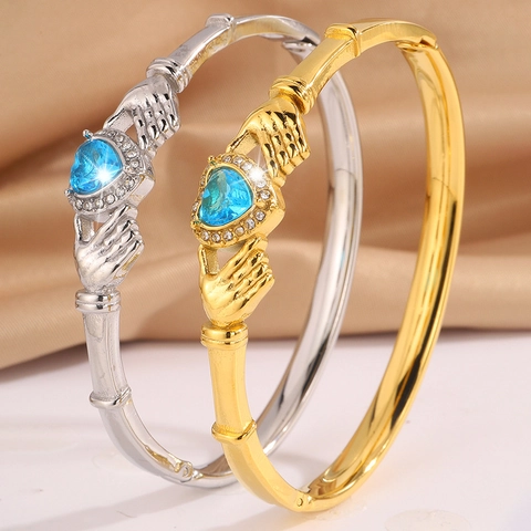 Bracelet Jonc Claddagh en Acier Inoxydable pour Femme Plaqué Or Argent Pierre Cœur Bleue Strass Mains Tenant Cœur