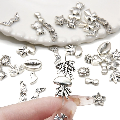 Ciondoli In Lega Perline Distanziatrici Colore Argento Cuore Croce Farfalla Sirena Stella Animali Per DIY Collana Bracciale Gioielli
