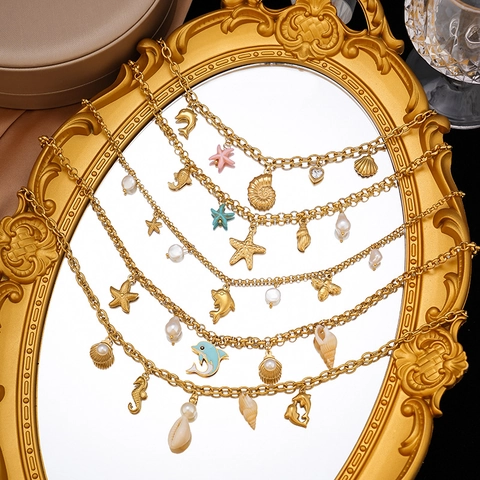 Collana in Acciaio Inossidabile a Tema Oceano per Donna Pendente a Stella Marina Conchiglia Perla Artificial Delfino Gioielli