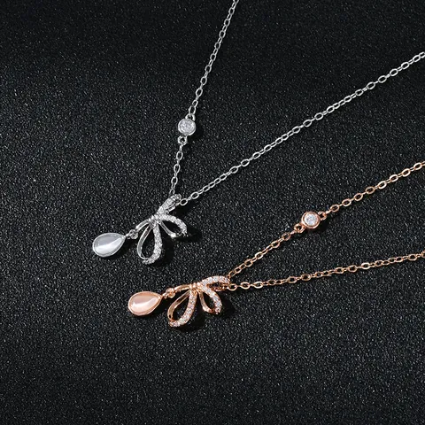 Elegant Copper Bowknot Pendant Necklace Real Gold Plated with Drop Shaped Cat Eye Stone Micro Pave Zirconia Jewelry for Women Gift