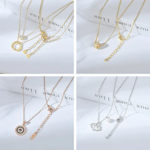 Collana con Pendente in Rame e Acciaio Inossidabile con Zirconia per Donna Placcata Oro Tripli Anelli Farfalla Stella Luna