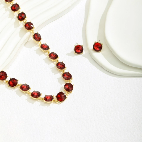 Elegantes Legierung Rotes Strass Schmuckset Gold Vergoldet Runde Kristall Halskette Und Ohrringe Für Damen Hochzeit Party