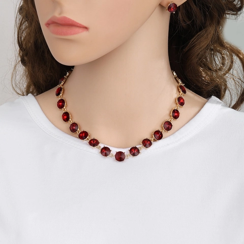 Elegantes Legierung Rotes Strass Schmuckset Gold Vergoldet Runde Kristall Halskette Und Ohrringe Für Damen Hochzeit Party