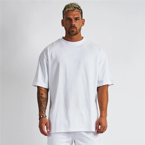 T-Shirt Oversize en Coton pour Hommes Épaules Tombantes Coupe Large Décontracté Couleur Unie Fitness Manches Courtes
