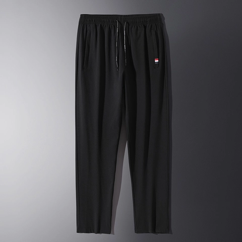 Pantalon de Sport Décontracté pour Homme Couleur Unie Cordon de Serrage Taille Élastique Jogging avec Poches Zippées
