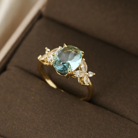 Elegante Anello in Rame Placcato Oro Zirconia Blu Cielo Ovale Con Pietre Laterali a Farfalla Gioielli Vintage da Donna