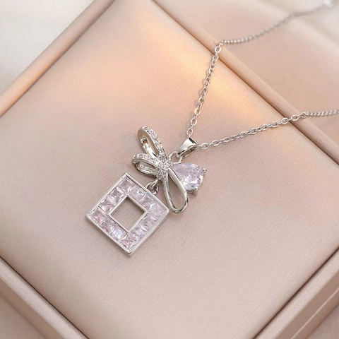 Luxus Titanstahl Schleife Quadrat Anhänger Schmuckset Mit Farbigem Zirkon Halskette Und Ohrringe Für Damen Elegantes Geschenk
