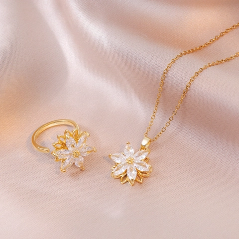 Stainless Steel Rotating Zirconia Flower Pendant Necklace And Ring Elegant Gold Silver Women Fashion Jewelry Collection