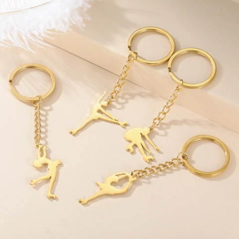 Porte-clés Silhouette de Patineur en Acier Inoxydable pour Femmes Filles Élégant Pendentif de Patinage à Roulettes Sport Accessoire