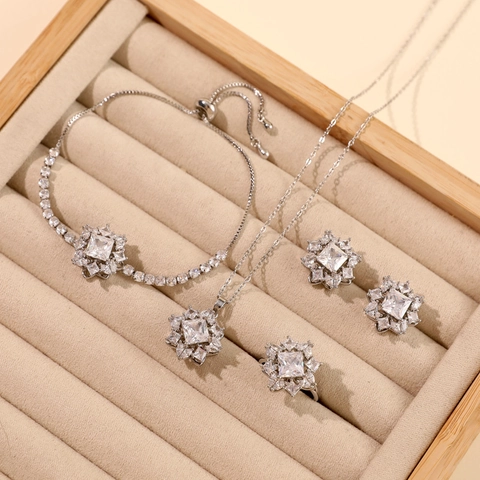 Rotierender Zirkonia Blume Schmuck Titanstahl Gold Silber Plattiert Halskette Ring Ohrringe Armband Damen Accessoire