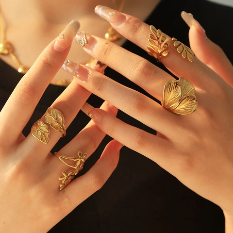 Bague Ouverte Vintage en Acier Inoxydable pour Femme Plaqué Or Ajustable Creux Feuille Plume Floral Bijoux Bague Cadeau
