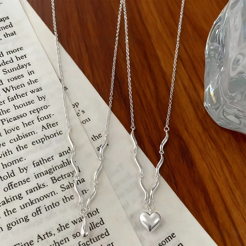 Collana con Pendente a Cuore e Goccia d'Acqua in Rame Placcato Argento Eleganza Francese Donna Girocollo Minimalista