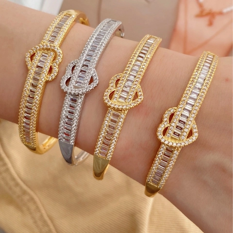 Ensemble de Bracelet Jonc Ouvert et Bague Ouverte Réglable en Cuivre Plaqué Or 18K Avec Nœud en Cœur et Zircone Scintillante Femme