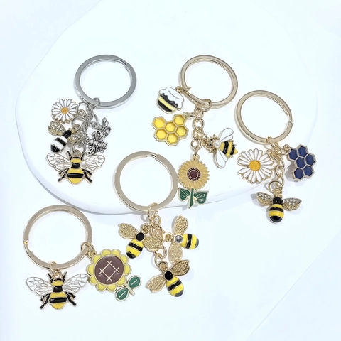 Porte-clés Pastoral en Alliage Émail Abeille Tournesol Créatif Marguerite Bijou de Sac Nid d'Abeille Pendentif Floral Porte-clés Bijoux Femme