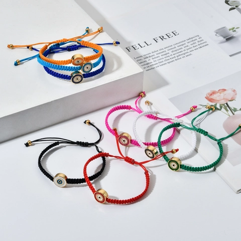 Bracelet Bohémien en Corde Tressée Mauvais Œil pour Femme Ajustable Amulette de Chance Rond Émail Alliage Tissé à la Main Bijou