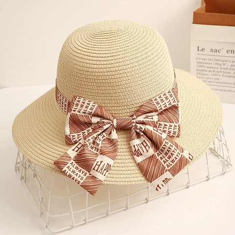 Women's Summer Straw Bucket Hat Elegant Bowknot Letter Print Sun Protection Wide Brim Beach Vacation Foldable Sun Hat