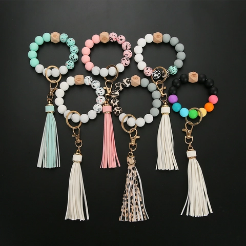 Bracciale Portachiavi in Perline di Silicone Con Nappina in Pelle Perla Esagonale in Legno Malocchio Portachiavi Donna