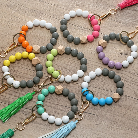 Portachiavi a Bracciale con Perline di Legno Colorate alla Moda con Nappa in Pelle PU Portachiavi a Braccialetto per Donna