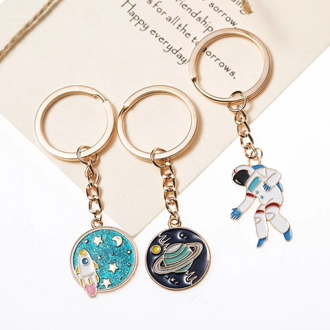 Space Astronaut Rocket Planet Saturn Alloy Enamel Keychain Gold Metal Star Moon Bag Charm Pendant Jewelry For Women Men