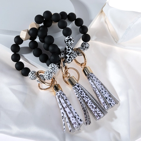 Beaded Bracelet Keychain With PU Leather Tassel Cow Print Dog Paw Number Print Wood Beads Wristlet Keychain For Women Jewelry