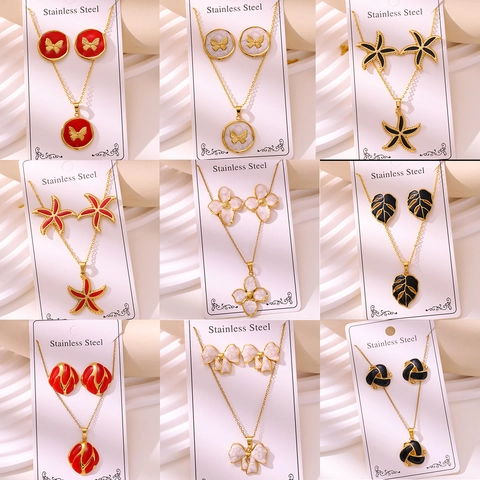 Set di Gioielli in Acciaio Inossidabile di Moda per Donna Placcato Oro Smalto Fiore Farfalla Stella Marina Collana e Orecchini