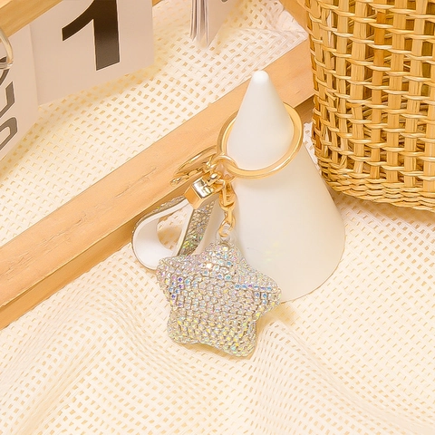 Porte-clés Étoile en Strass de Luxe pour Femmes Alliage d'Or Pentagramme Charme de Sac Avec Bracelet en Cuir Synthétique