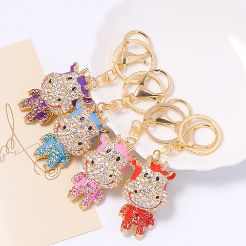 Süßer Cartoon Ochse Strass Schlüsselanhänger Zinklegierung Emaille Kuh Anhänger Tasche Anhänger Für Damen Mädchen Geschenk