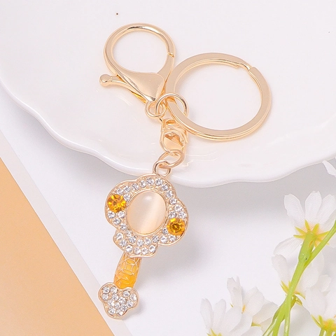 Chinese Vintage Lucky Ruyi Keychain Gold Plated Alloy Rhinestone Cat Eye Stone Braided Leather Cord Bag Charm Key Ring Gift