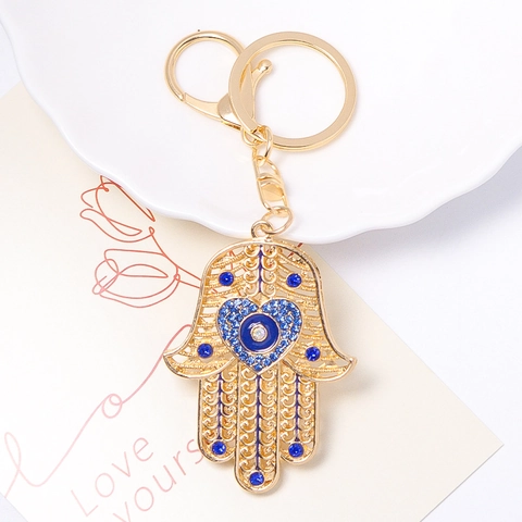 Llavero Mano de Hamsa Mal de Ojo Chapado en Oro Aleación de Zinc Strass Corazón Hueco Colgante Protección Para Mujer Accesorio Bolso Regalo