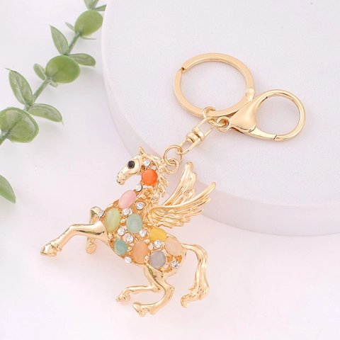 Luxus Pegasus Schlüsselanhänger Zinklegierung Bunter Katzenaugenstein Strass Inlaid Tier Pferd Anhänger Tasche Charm Damen Geschenk