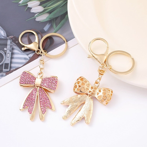 Portachiavi in Lega di Zinco con Fiocco in Strass Moda Carino Anello Chiave Metallo Donne Borsa Ciondolo Fascino Accessorio