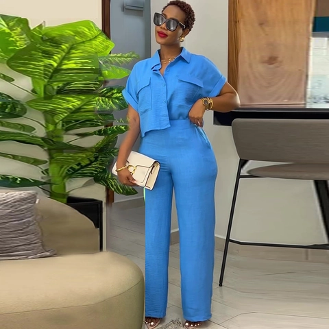 Dames Zomer Casual Tweedelige Outfit Korte Mouw Revers Knoop Shirt En Hoge Taille Wijde Pijpen Broek Getextureerd Crinkle Pak