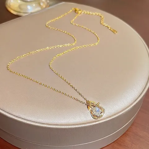 Collana con Pendente a Zucca Hulu con Pietra Danzante per Donna Acciaio al Titanio Placcato Oro Strass Gioielli Chic Regalo