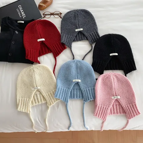 Hoge Kwaliteit Australische 100% Wol Gebreide Oorklepmuts Voor Dames Winter Warm Effen Kleur Met Veter Zachte Gebreide Muts