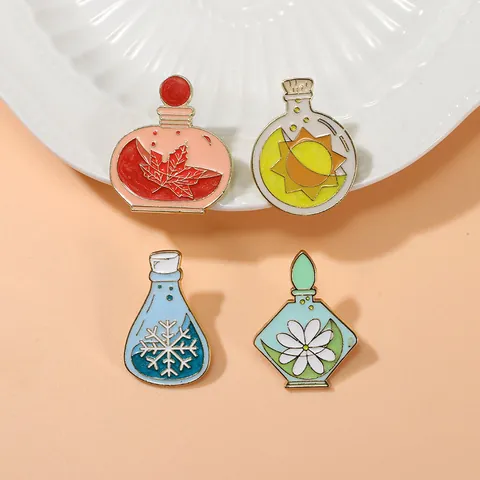 Creative Alloy Enamel Potion Bottle Pins Seasons Theme Flower Sun Moon Maple Leaf Snowflake Cartoon Brooches For Clothing Bags